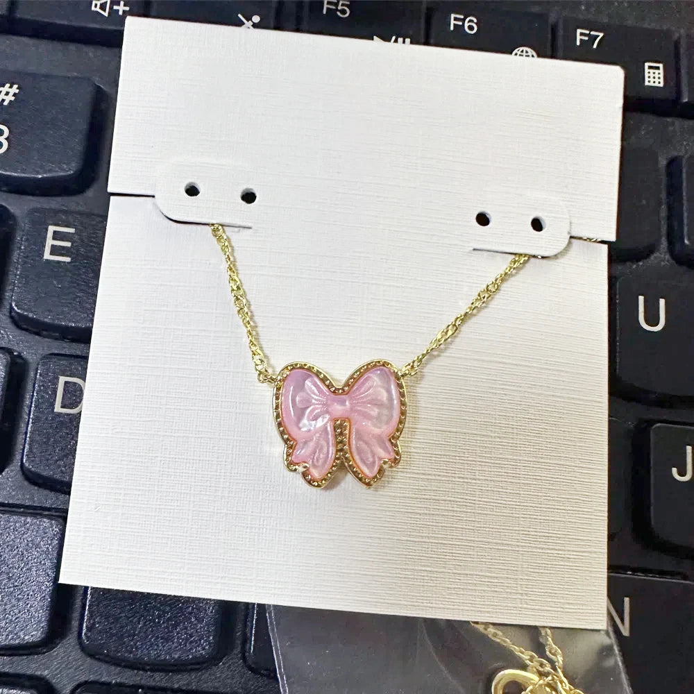 Haley Gold Bow Pendant Necklace – Mother-of-Pearl Short Necklace Kendra Scott