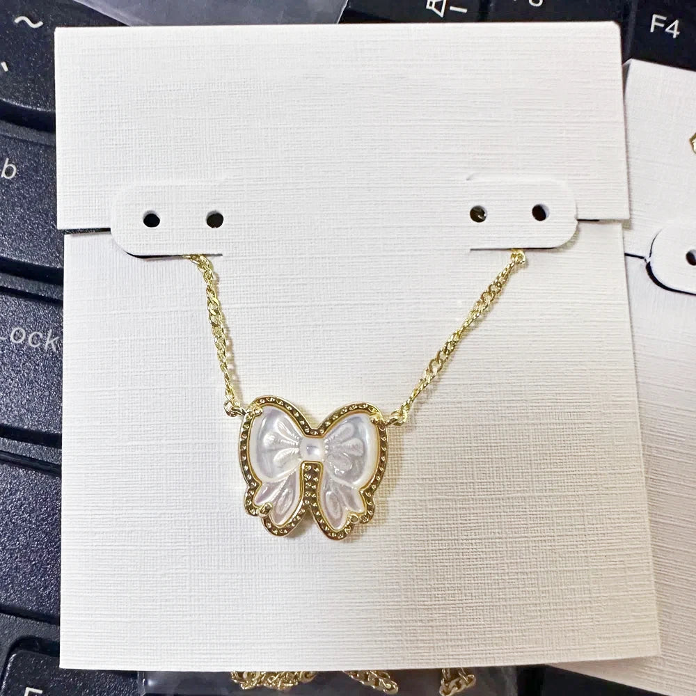 Haley Gold Bow Pendant Necklace – Mother-of-Pearl Short Necklace Kendra Scott