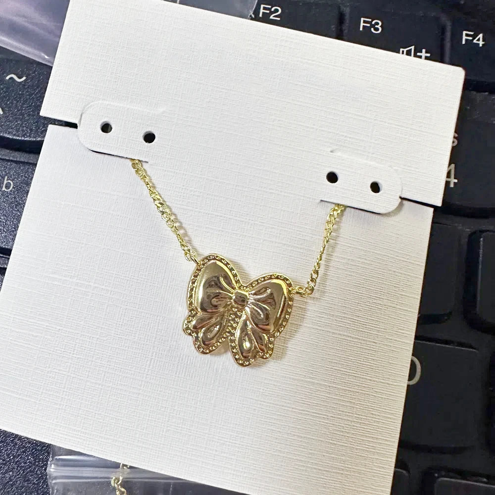 Haley Gold Bow Pendant Necklace – Mother-of-Pearl Short Necklace Kendra Scott