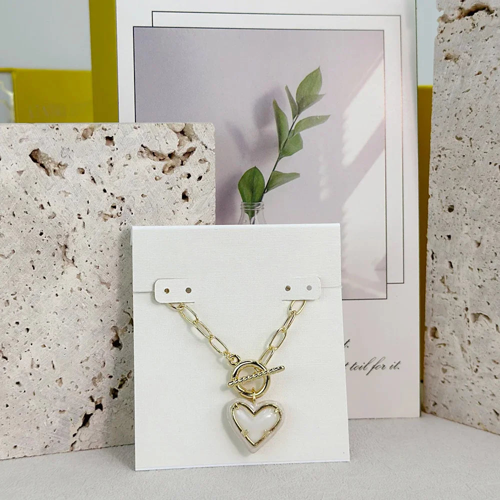 Ari Heart Necklace & Earrings Set – Gold Enamel Frame with Ivory Mother-of-Pearl- Kendra Scott